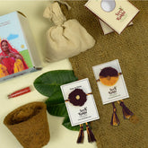 Amaltash & Brinjal Seed Rakhi - Set of 2 Rakhi With Planter And Roli