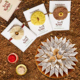 Sun, Moon and Dhavala Seed Rakhi Gift Hamper With Kaju Katli Mini Bites 125 gm