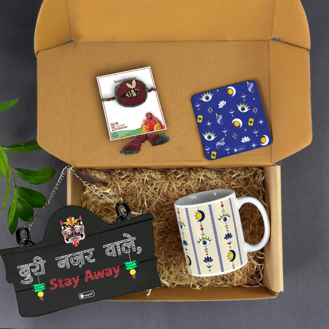 Neel Nazar Battu Seed Rakhi Hamper