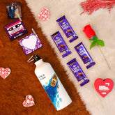 Valentine Gift Hamper with 'Be The Ocean' Printed Water Bottle (750ml), Set of 2 Clip Magnets, Red Rose, Greeting Card & 4 Dairy Milk Chocolates
