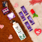 Valentine Gift Hamper with 'Not Cactus, Drink More Water' Printed Water Bottle (750ml), Set of 2 Clip Magnets, Red Rose, Greeting Card & 4 Dairy Milk Chocolates