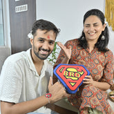 Super Bro Shape Cushion & Seed Rakhi Combo - Set of 2