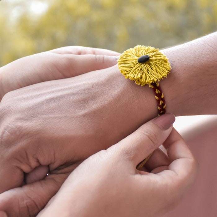 Red and Yellow Plantable Seed Rakhi With Kaju Katli Mini Bites 125 gm