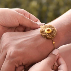Dhavala, Teddy Bear, Teddy Bear with Bow, Swastika, Sun, Maati and Neel Nazar Battu Eco-friendly Seed Rakhi (Set of 7)