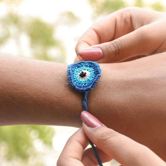 Neel Nazar Battu Eco-friendly Seed Rakhi Set of 2 With Kaju Katli Mini Bites 125 gm