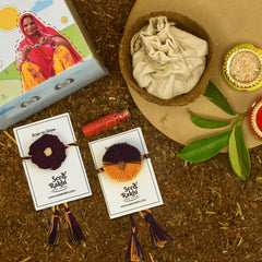 Amaltash &amp; Brinjal Seed Rakhi - Set of 2 Rakhi With Planter And Roli