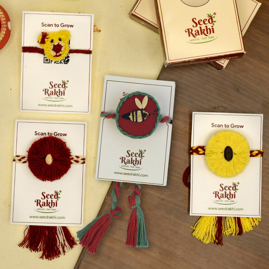 Red, Yellow, Teddy Bear with Bow and Neel Nazar Battu Seed Rakhi Set Of 4