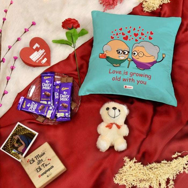 Love Is Growing Old With You Printed Cushion, Photo Stand, Card, Rose, Cute Teddy, and Cadbury Chocolates - Gifts for Love