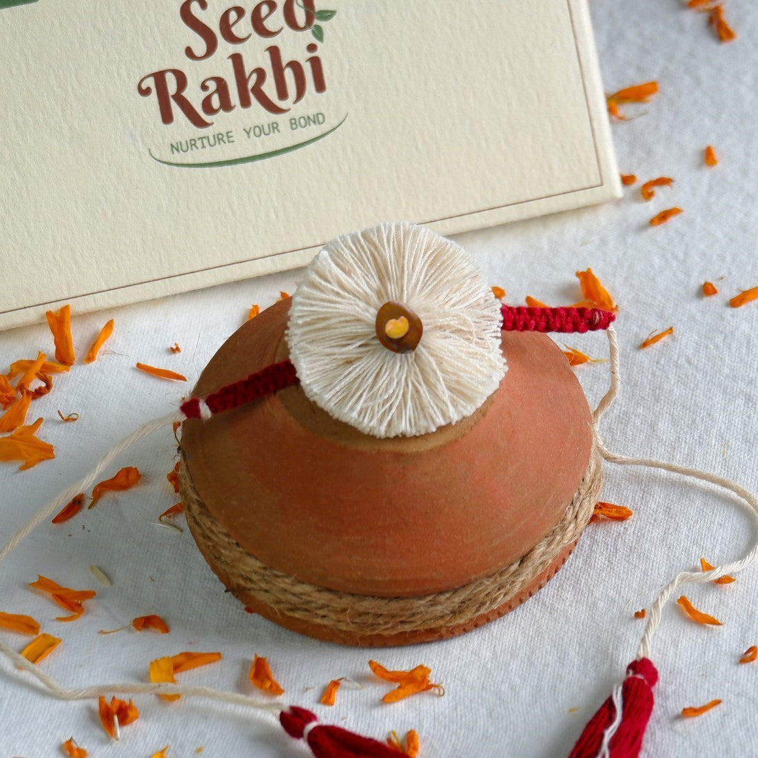 Bhindi, Amaltash &amp; Brinjal Set of 2 Premium Seed Rakhi Hamper With Kaju Katli Mini Bites 125 gm