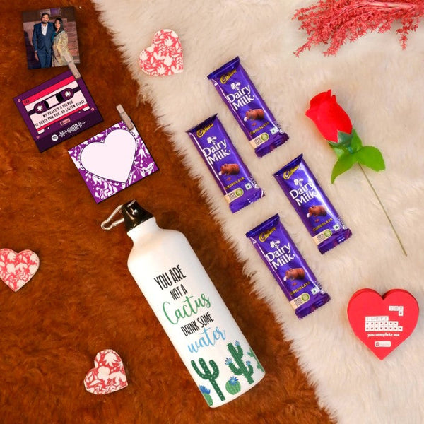 Valentine Gift Hamper with 'Not Cactus, Drink More Water' Printed Water Bottle (750ml), Set of 2 Clip Magnets, Red Rose, Greeting Card &amp; 4 Dairy Milk Chocolates