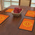 Rangoli Design with Marigold Flower (Orange) Table Mat